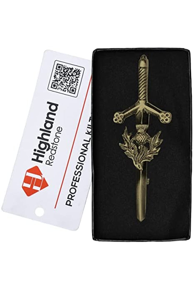 Antique Kilt Pin with a detailed thistle design, perfect for adding elegance to your kilt outfit.